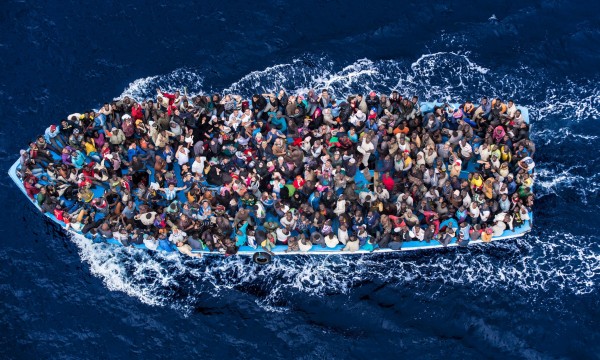 Boat Migrants Risk Everything for a New Life in Europe:  African asylum seekers rescued off boats and taken aboard an Italy navy ship, June 8, 2014.