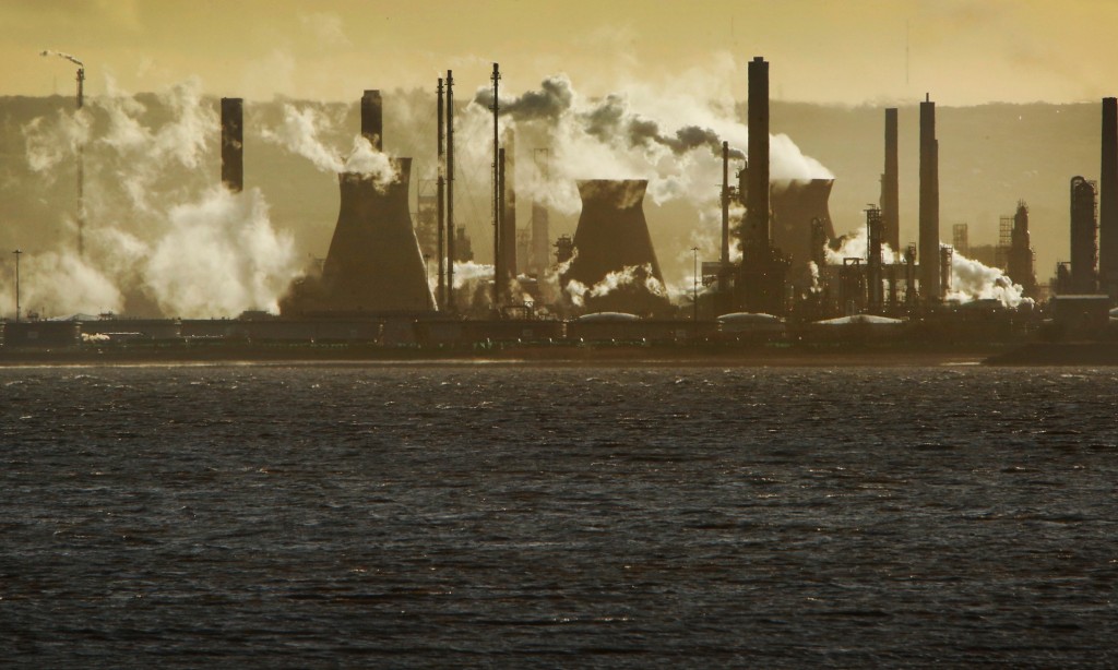 The INEOS oil refinery at Grangemouth. Grangemouth Refinery today employs over 1300 people over a 700 hectare site. The Forties Pipeline System terminates at the Grangemouth refinery, where the crude oil stabilisation plant is situated. Some crude oil is refined in Grangemouth and the remainder flows via another pipeline to a storage tank area, and onwards to tanker loading terminals in the River Forth downstream of the Forth Bridges. Other crude oil for the refinery is landed at Finnart Ocean terminal on Loch Long, which can receive tankers up to the 324,000 dwt class. The oil is then pumped to the refinery through a 58-mile pipeline system across Scotland. The refinery provides feedstock to an important group of chemical factories on an adjoining site. Scotland, UK 24/2/2015 © COPYRIGHT PHOTO BY MURDO MACLEOD All Rights Reserved Tel + 44 131 669 9659 Mobile +44 7831 504 531 Email:  m@murdophoto.com STANDARD TERMS AND CONDITIONS APPLY  see for details: http://www.murdophoto.com/T%26Cs.html No syndication, no redistrubution, Murdo Macleod's repro fees apply. A22CGM