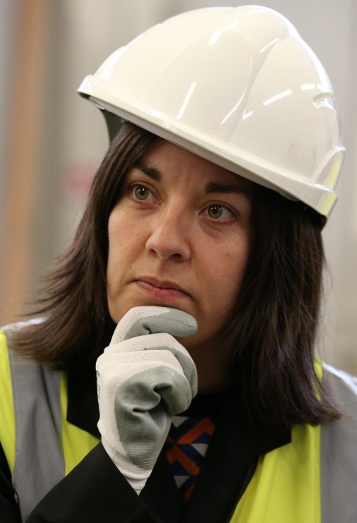 Scottish Labour deputy leader Kezia Dugdale looks on during a visit to a bricklaying workshop at New College Lanarkshire near Motherwell.